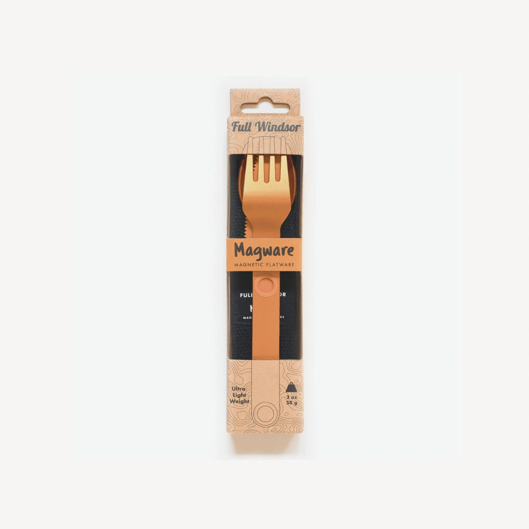Orange fork, knife and spoon connected in packaging.