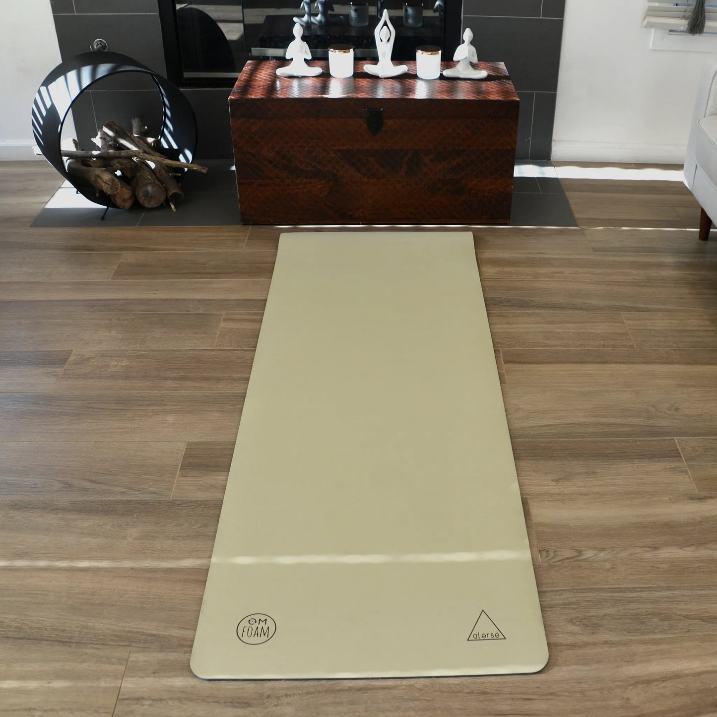 Tan yoga mat lying flat.