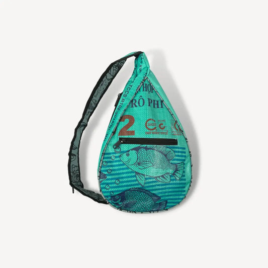 Green sling bag with a fish on it.