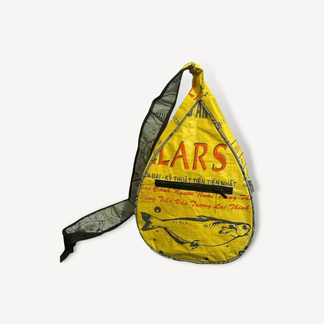 Yellow sling bag with a fish on it.