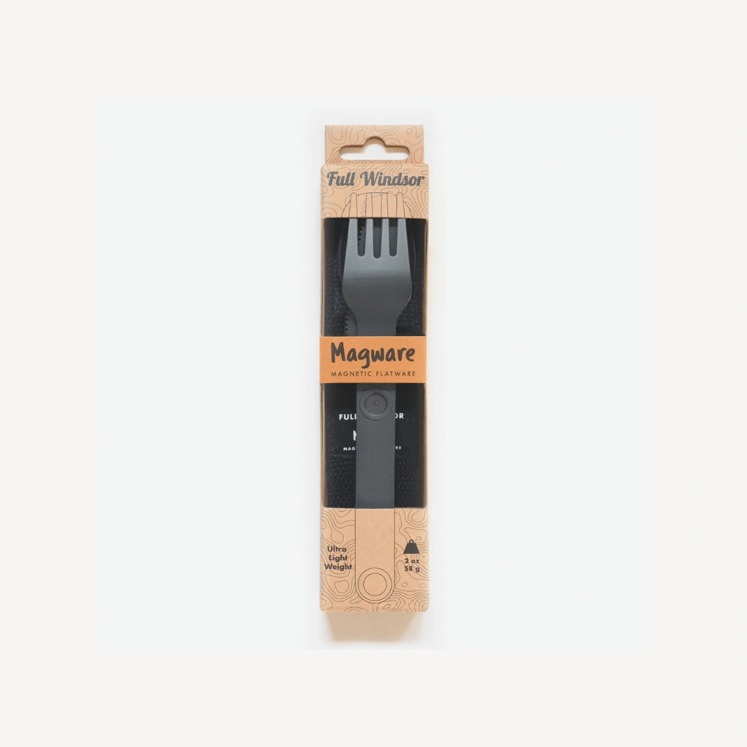 Black fork, spoon and knife in packaging.