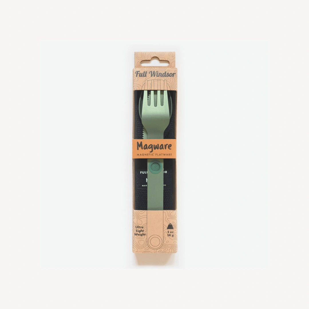 Green fork, knife and spoon connected in packaging.