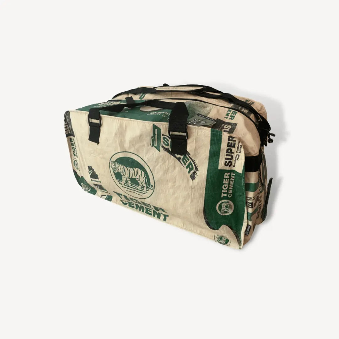 White and green duffel bag with a tiger on it.