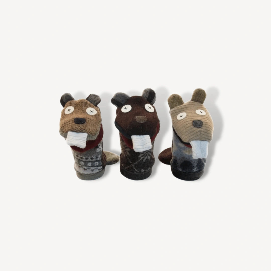 Three different looking brown beaver hand puppets.