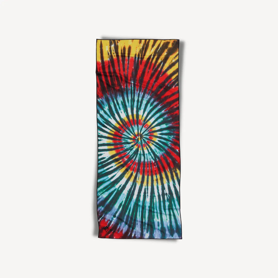 Red, blue, yellow and white tie-dye beach towel.