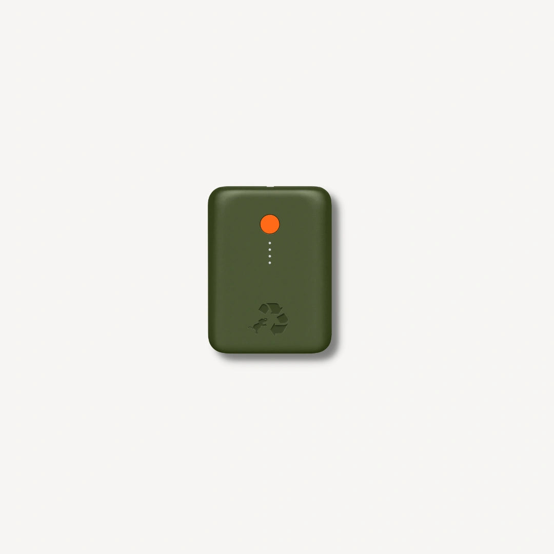Green portable charger with orange button.