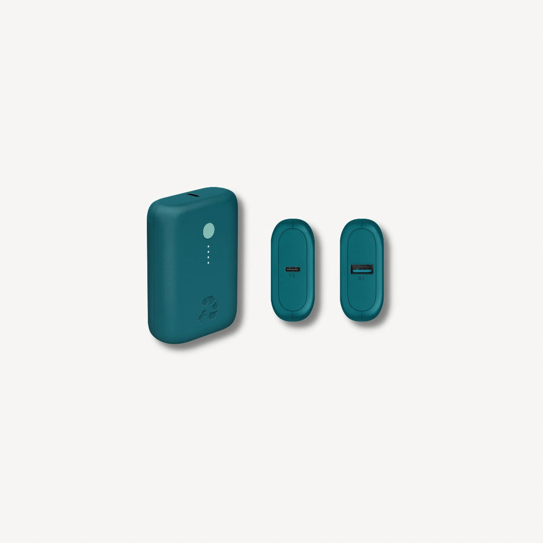 Turquoise portable charger with green button top and bottom.
