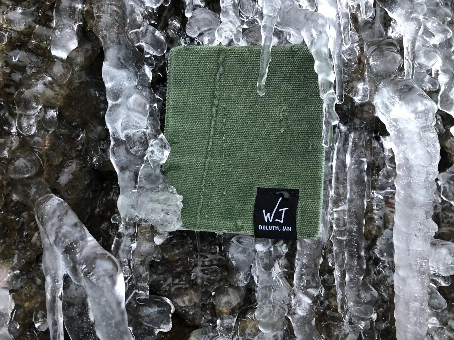 Green notepad in ice.